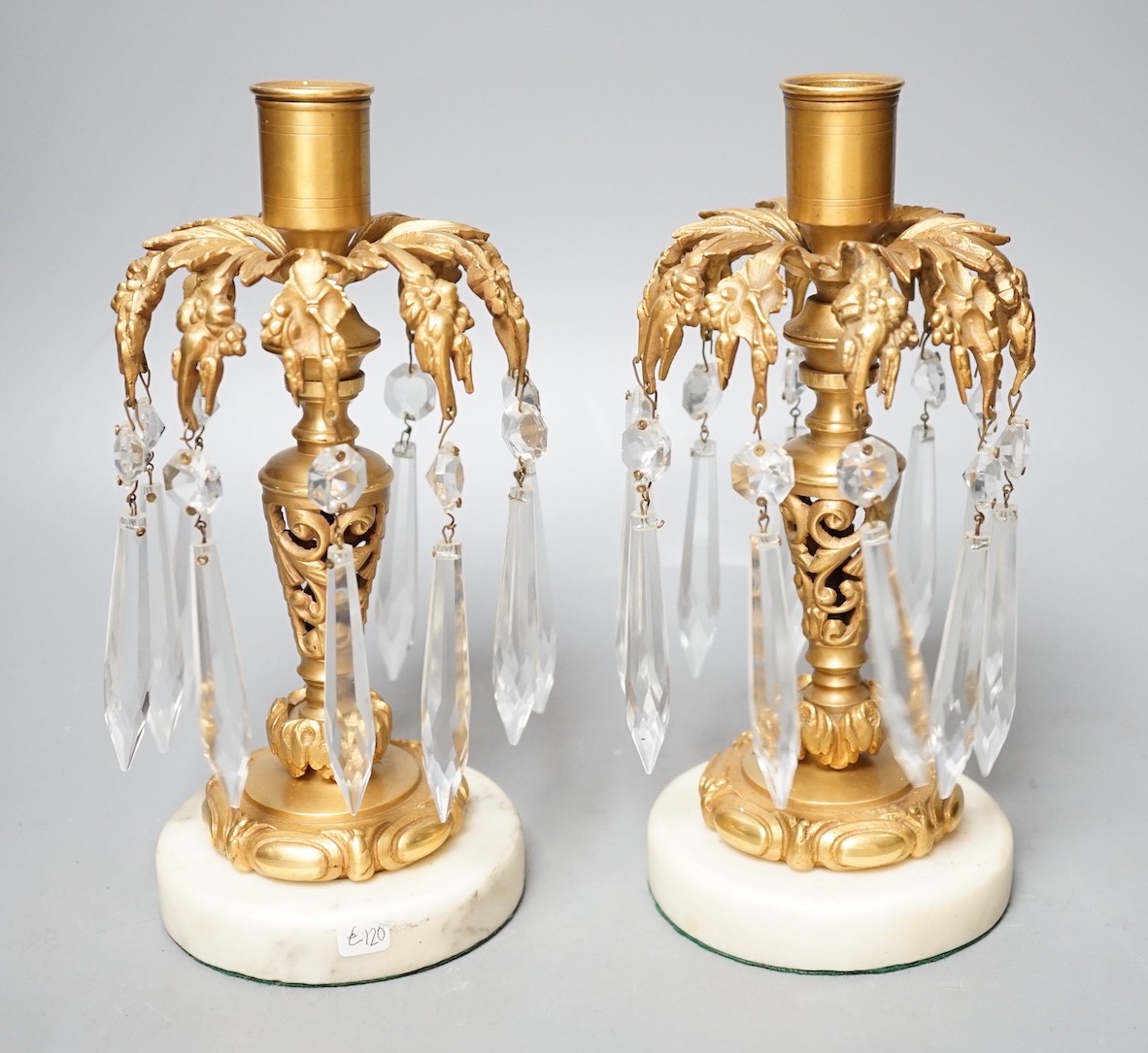 A pair of gilt metal and glass lustre drop candlesticks - 22cm tall